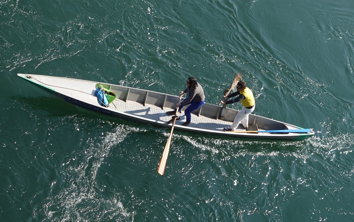 Boaters beneath the Covered Ponte, River Ticino
