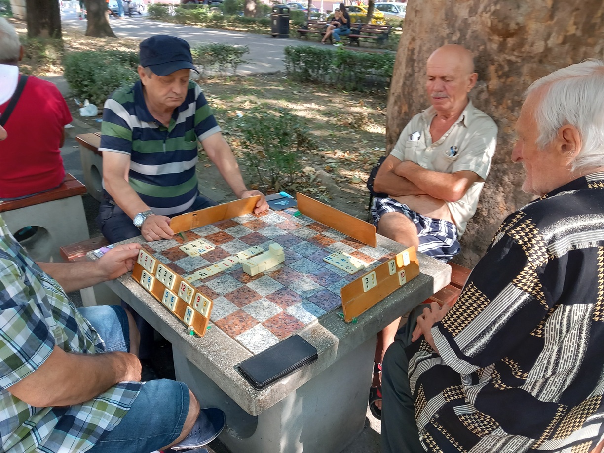 Men playing games in a park